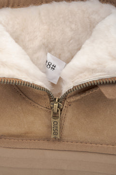 Warm and stylish beige women’s snow boots, crafted from genuine velour with a fur-lined interior.