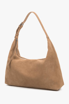Seitenansicht der beigen Damen-Shopper mit verstellbarem Schulterriemen.