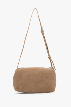 Ansicht der stilvollen beigen Velours-Tasche für Damen.
