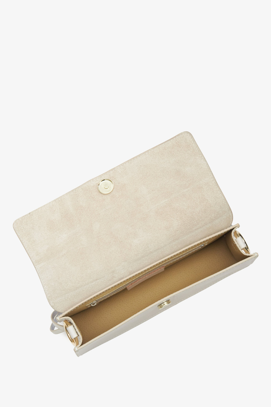 Damenhandtasche aus cremebeigem Leder – Nahaufnahme des Hauptfachs.