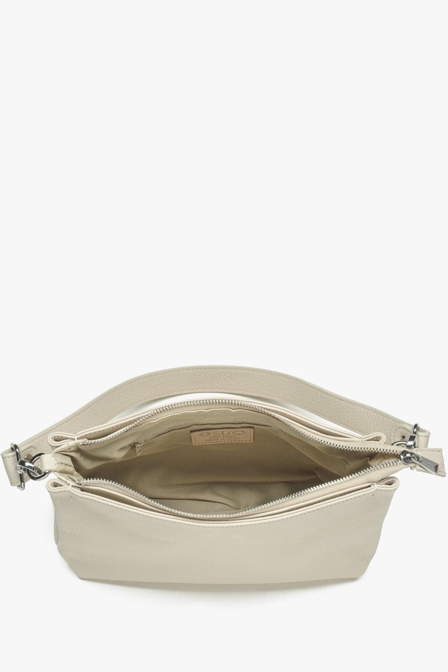 Hellbeige Damen-Umhängetasche aus echtem Leder von Estro – Nahaufnahme des Innenraums des Modells.