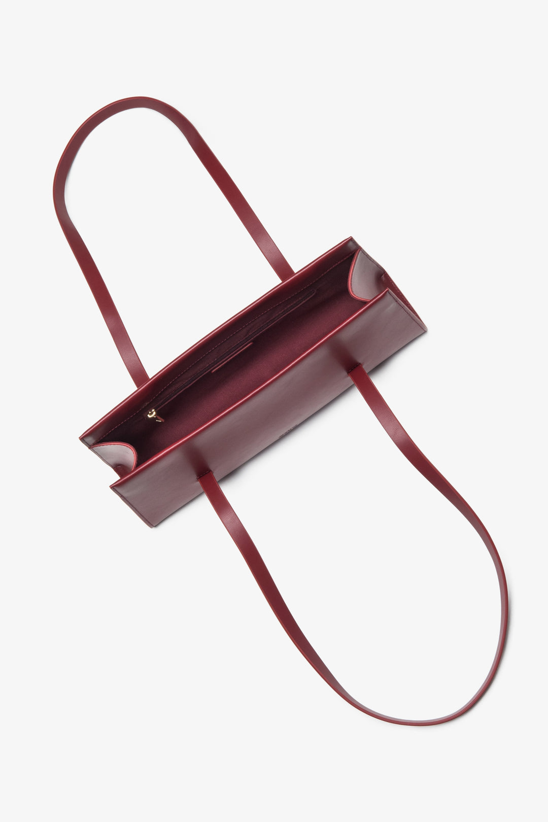 Praktische und stilvolle Damen-Handtasche in Bordeaux von Estro, aus echtem Leder gefertigt und mit langen Henkeln für bequemes Tragen über der Schulter versehen.