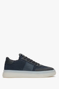Klassische Seitenansicht der dunkelblauen Damen-Winter-Sneakers aus Leder mit kuscheligem Fellfutter und robuster Sohle 