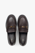Elegante dunkelbraune Slipper aus echtem Leder für Damen.