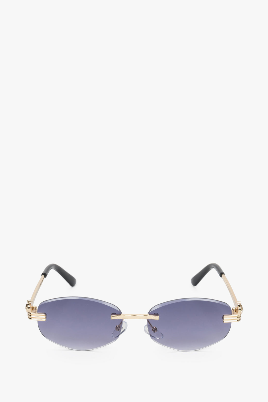 Frontansicht der grau-goldfarbenen ovalen rahmenlosen Damen-Sonnenbrille.