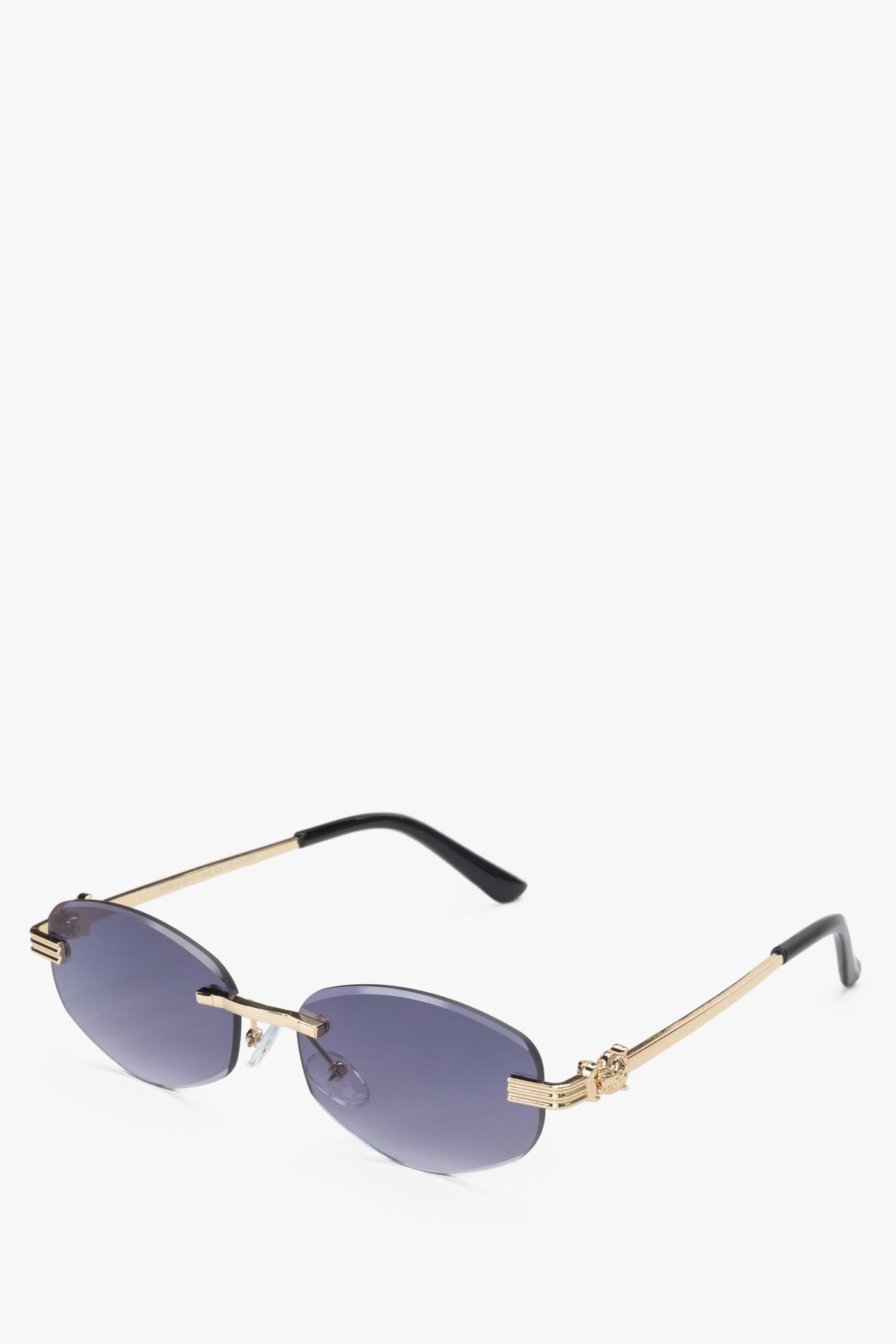 Schräge Ansicht der rahmenlosen Sonnenbrille mit edlen Bügeln aus Zinklegierung.