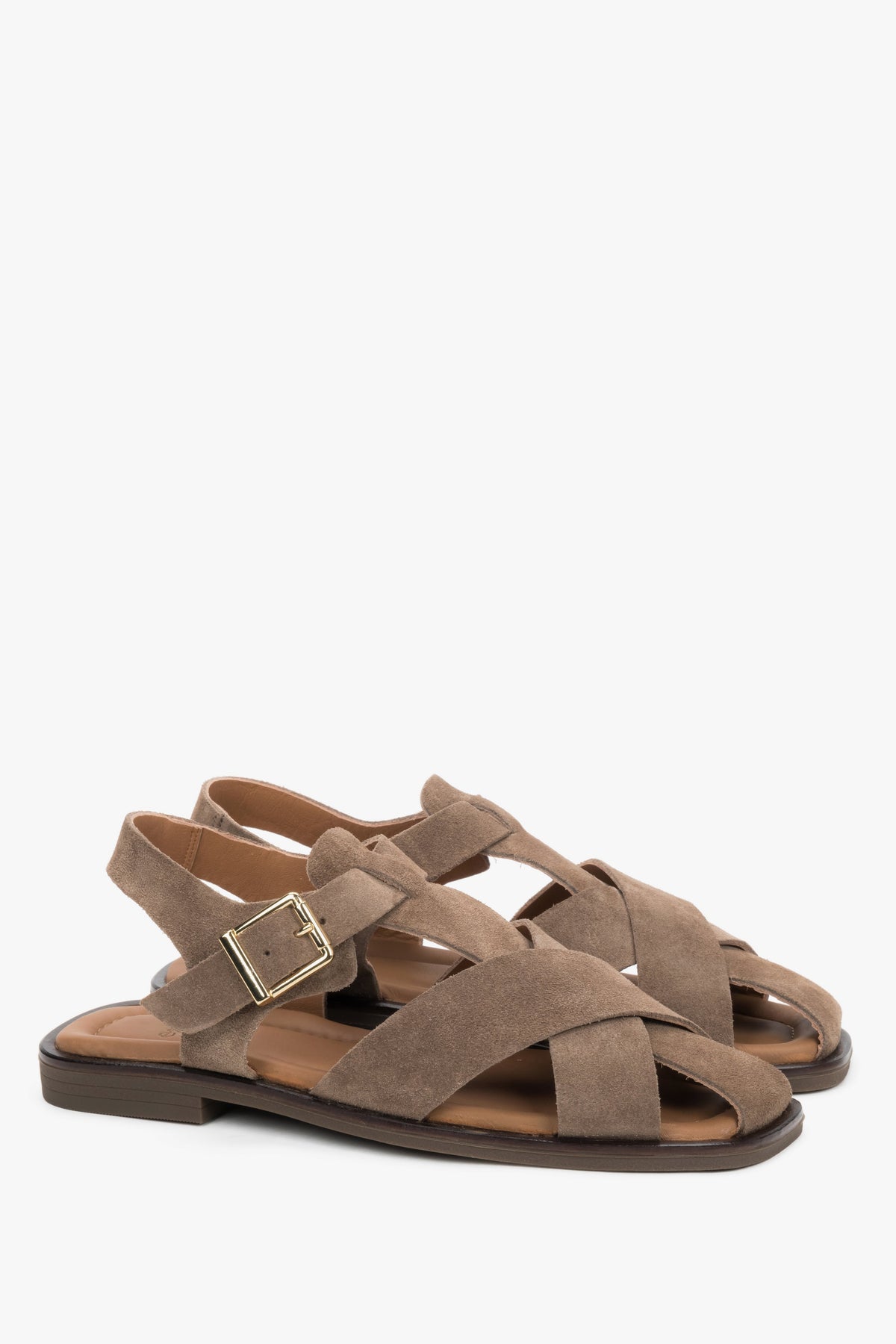 Graue Damen-Sandalen aus Veloursleder in schräger Vorderansicht mit gekreuzten Riemen