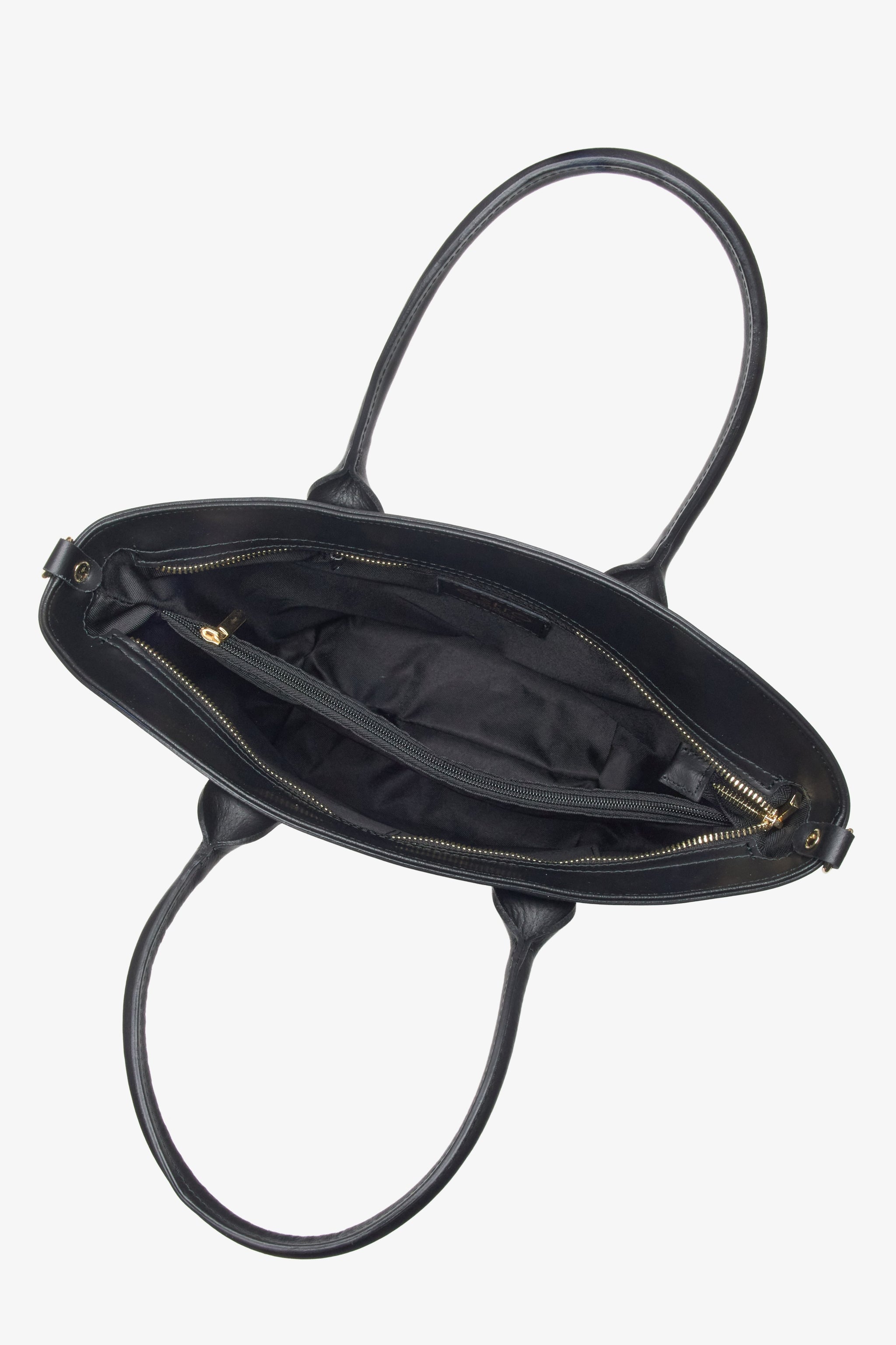 Innenansicht der schwarzen Ledertasche mit zwei Fächern und Reißverschluss