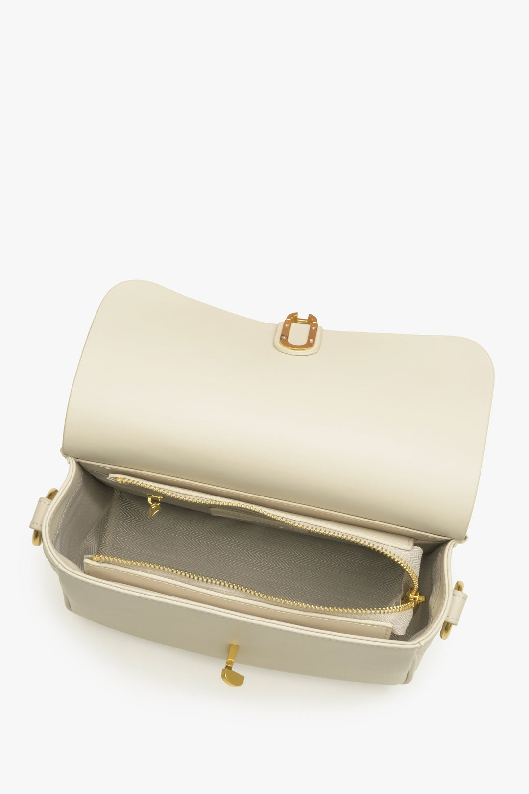 Damenhandtasche in Hellbeige aus echtem Leder von Estro – Nahaufnahme des Innenraums.