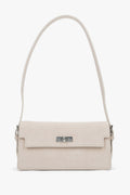 Hellbeige Damen-Schultertasche aus Veloursleder in Vorderansicht