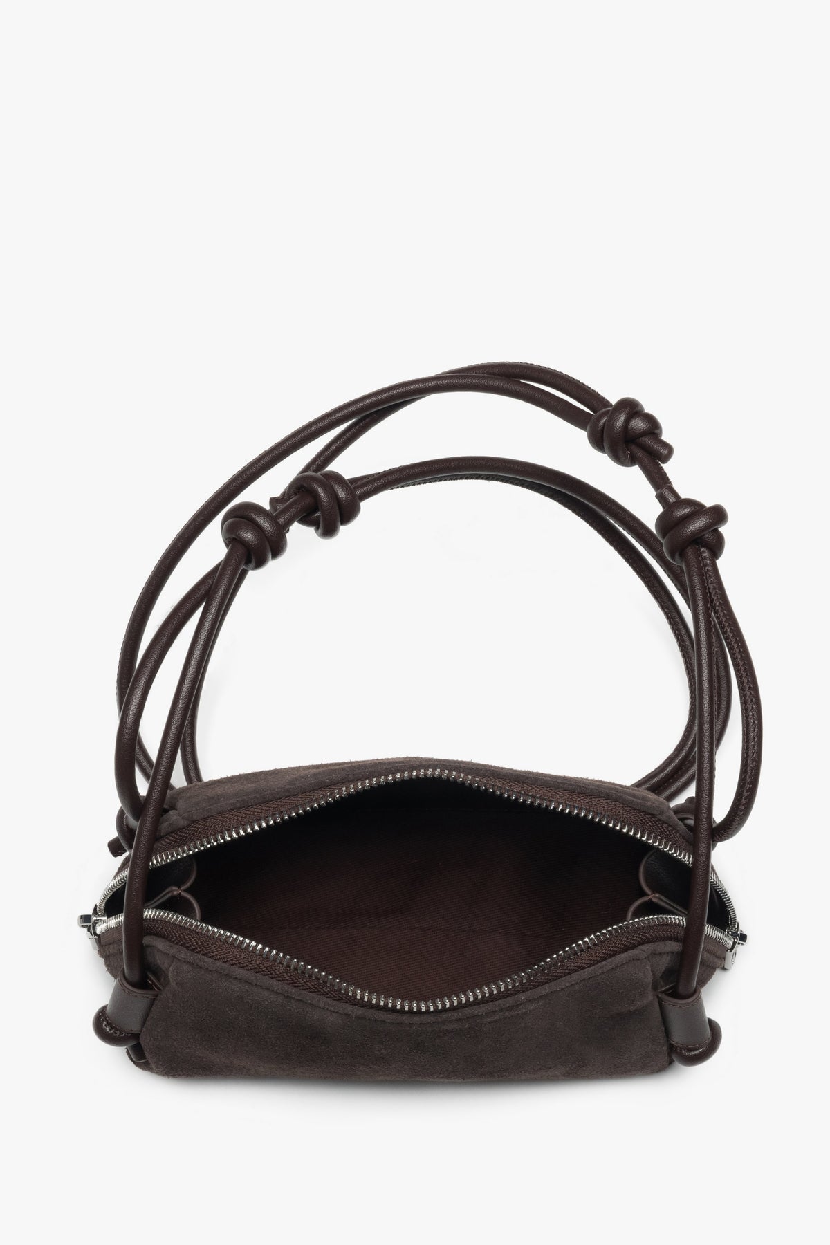 Blick in das geöffnete Innere der Handtasche mit Bügel-Verschluss und Textilfutter