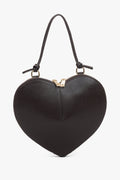 Frontale Ansicht der dunkelbraunen Damen-Schultertasche aus Glattleder in markanter Herzform