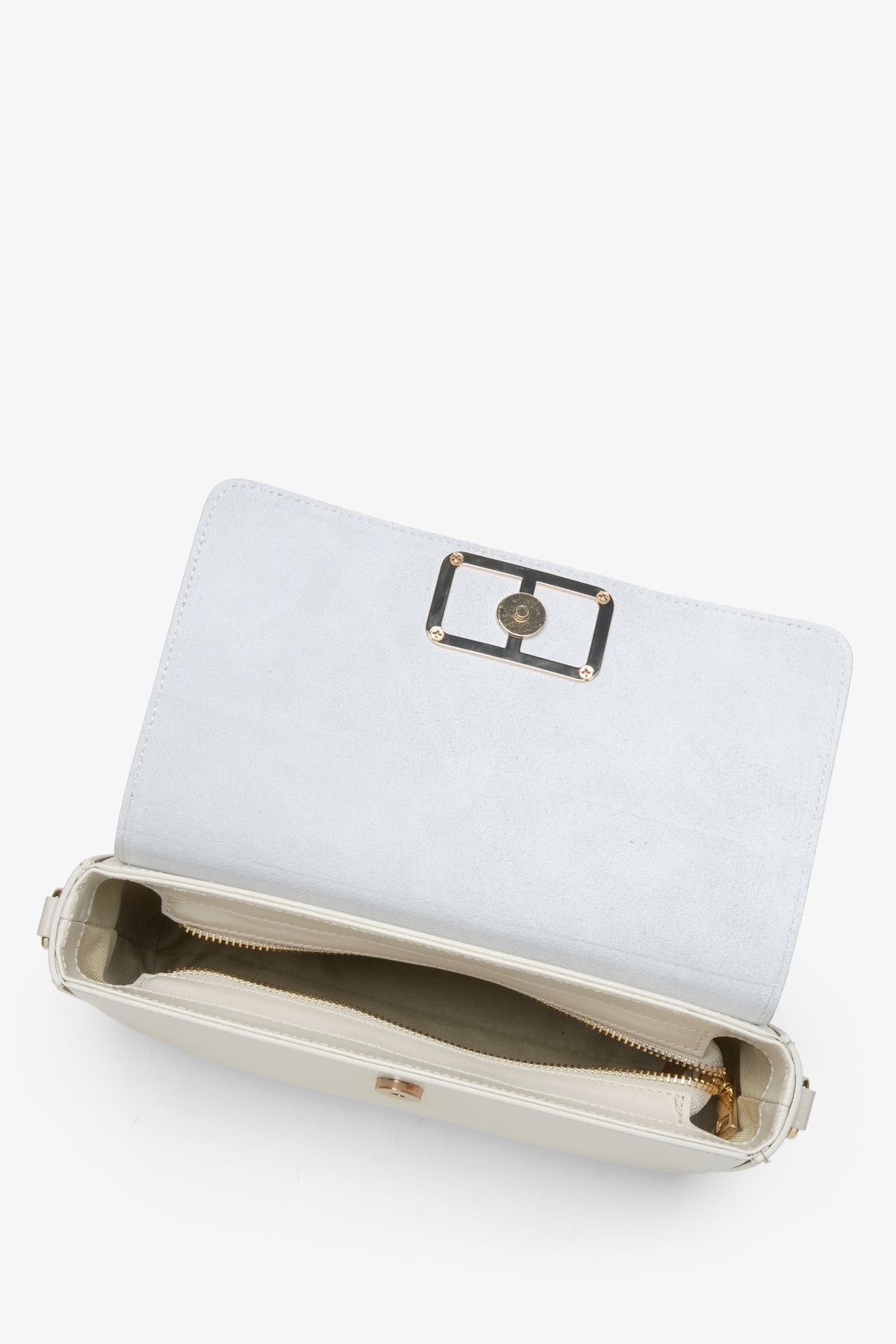 Kleine Damenhandtasche in milchig-beiger Farbe, im Baguette-Stil entworfen.