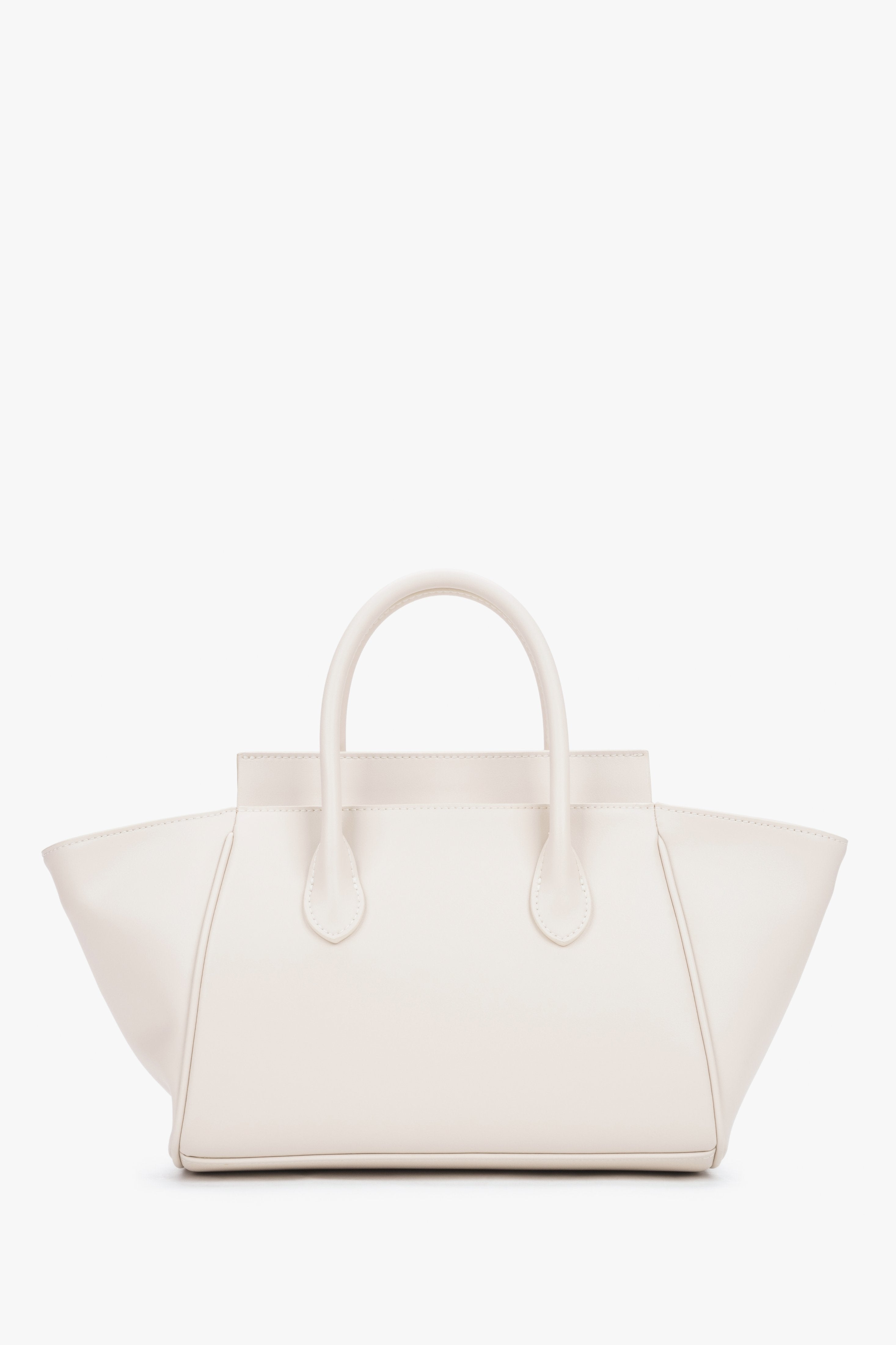 Milchbeige Echtleder-Tasche mit kurzen Griffen Seitenprofil