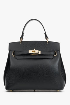 Frontale Ansicht der schwarzen Leder-Henkeltasche mit elegantem Goldverschluss und strukturiertem Finish 