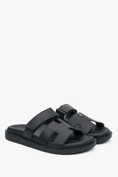 Schräge Ansicht der eleganten Schlupfschuhe für Damen in Schwarz.