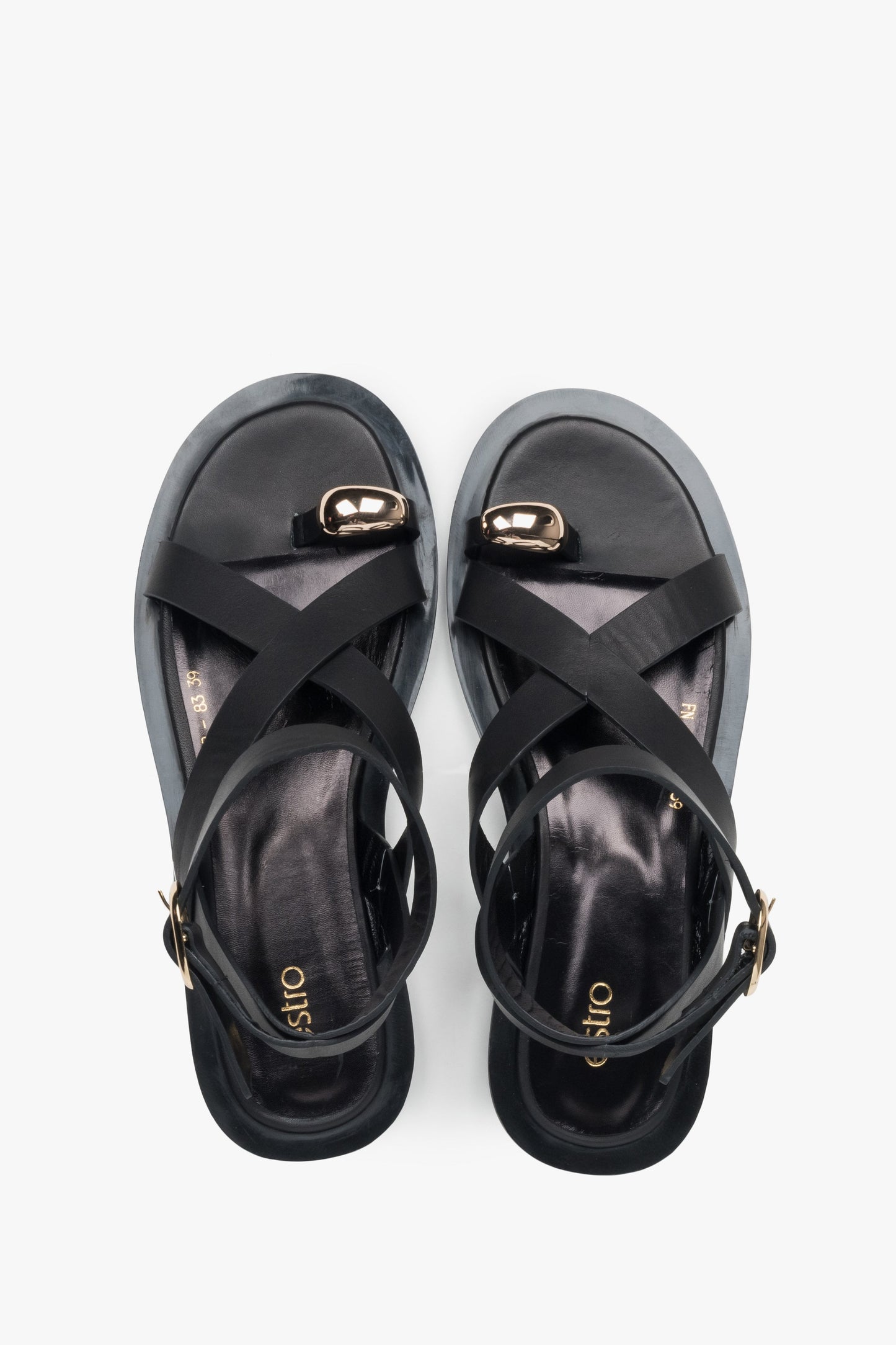 Schwarze Leder-Riemchensandalen von Estro mit elegantem Design und modischem Zehenring.