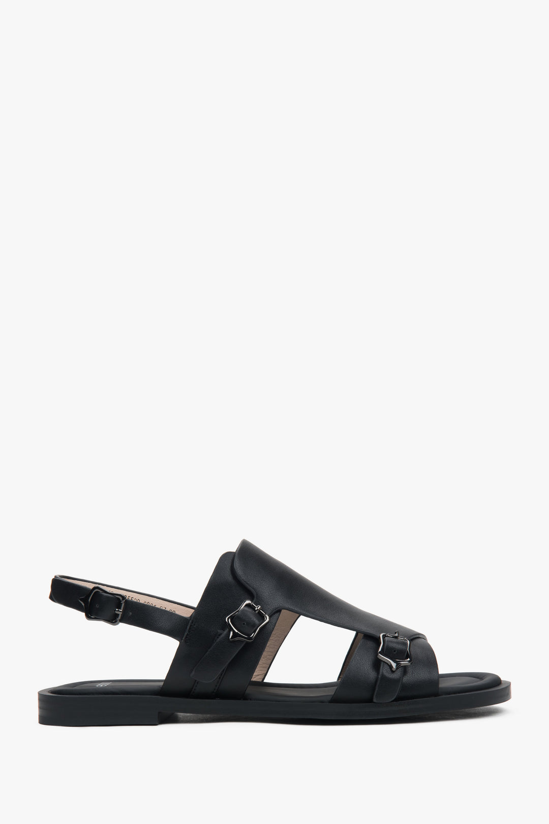 Profilansicht der schwarzen Leder-Sandalen mit flacher Sohle.