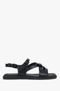 Profilansicht der schwarzen Damen-Sandalen aus weichem Echtleder.