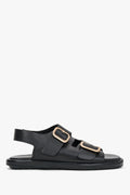 Seitenansicht der schwarzen Damen-Sandalen aus Leder mit goldenen Schnallen