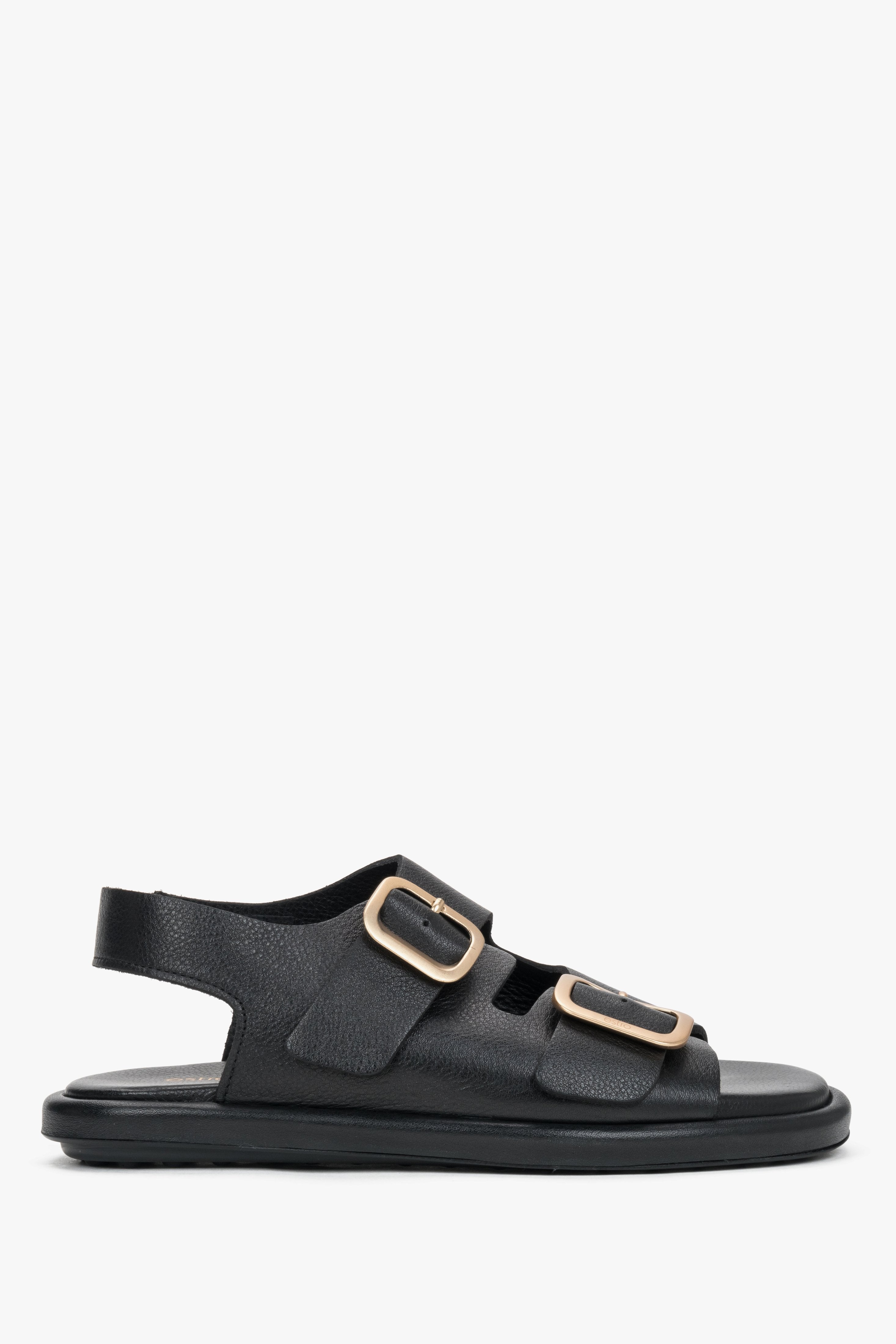 Seitenansicht der schwarzen Damen-Sandalen aus Leder mit goldenen Schnallen