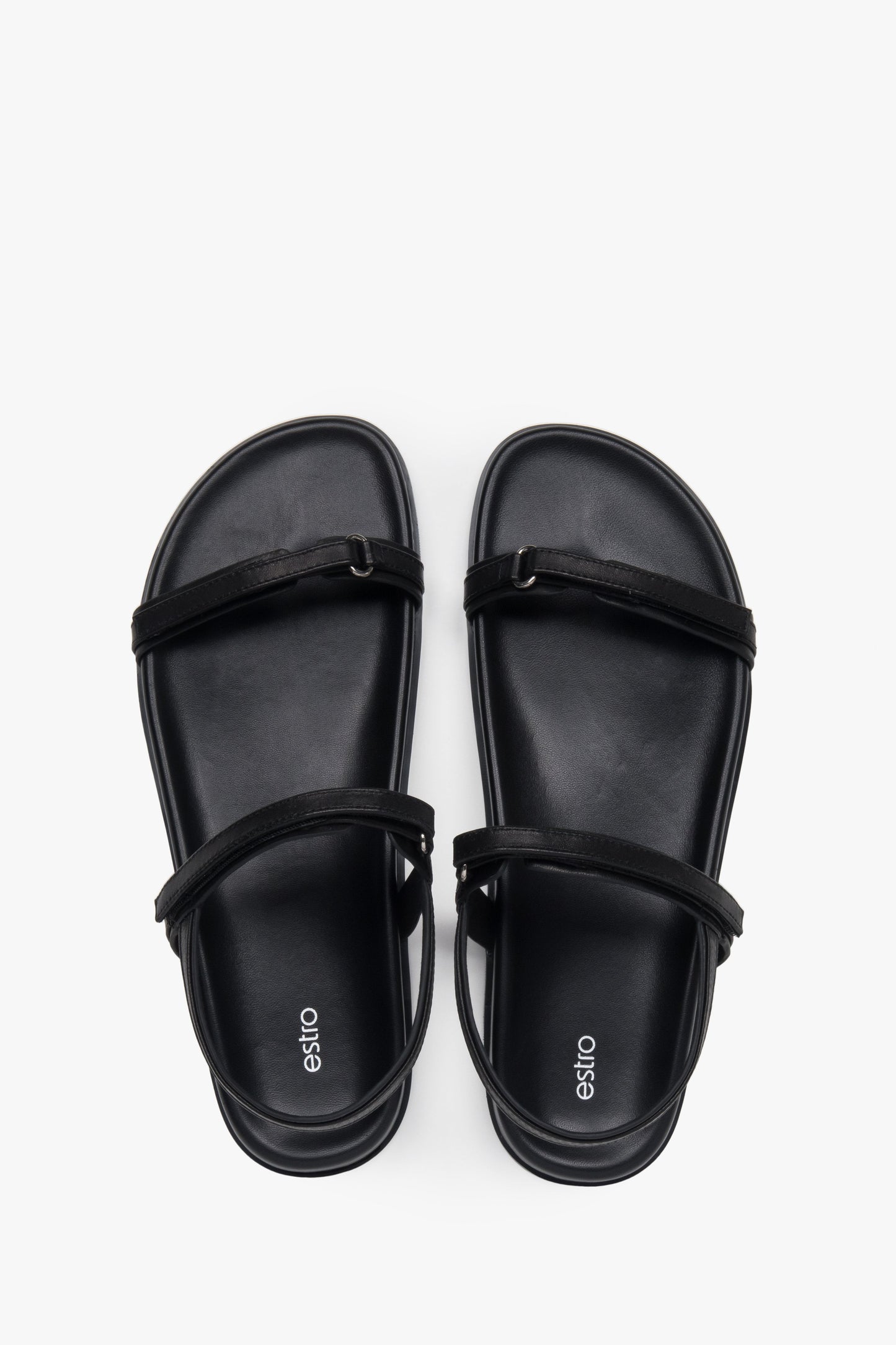 Stilvolle schwarze Damen-Sandalen von Estro mit minimalistischem Design aus dünnen Riemchen, die dank der flexiblen Sohle hohen Komfort bieten.