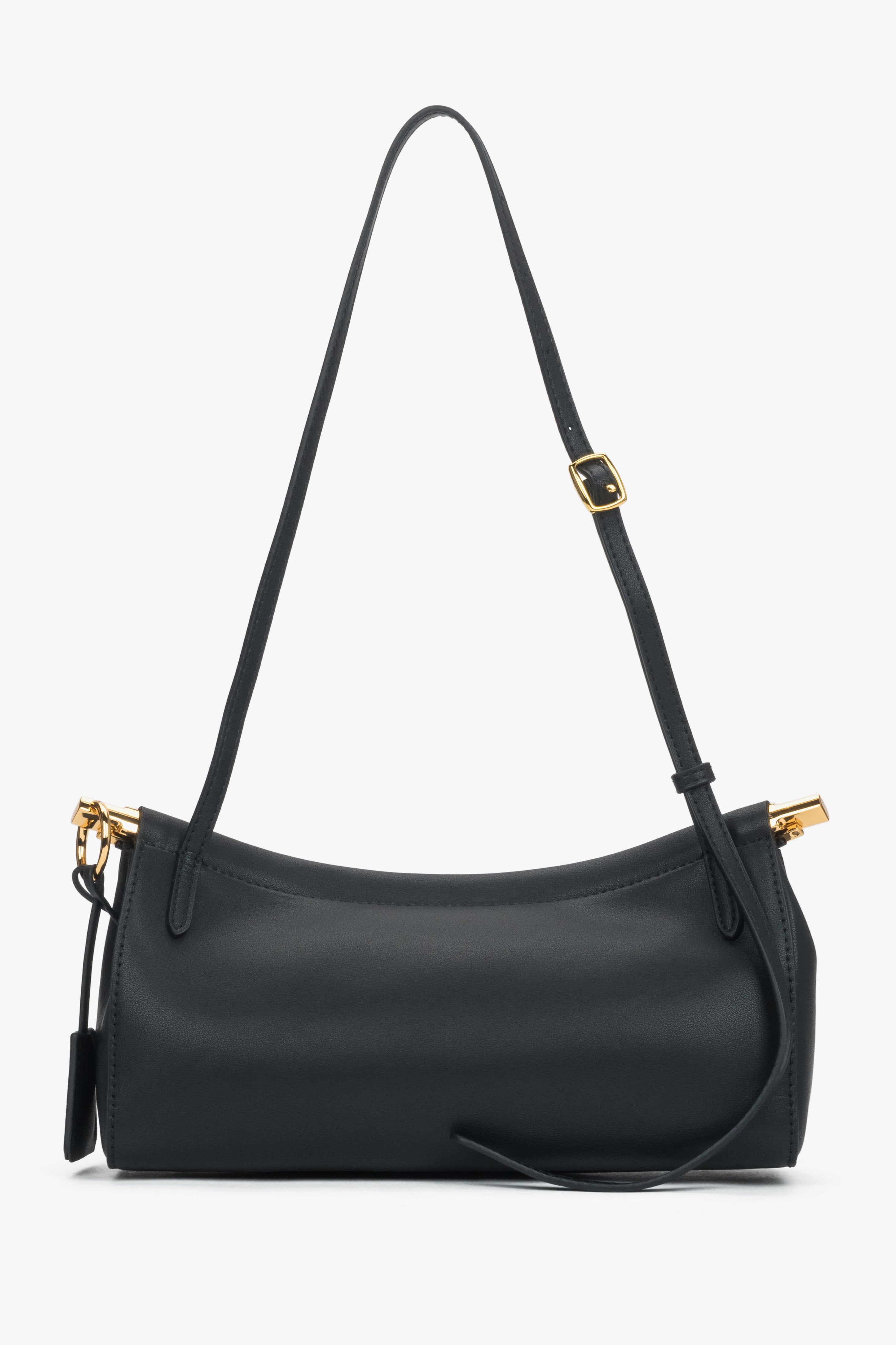 Seitenansicht der eleganten Estro Ledertasche mit Fokus auf den schmalen Schulterriemen.