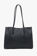 Frontale Ansicht der geräumigen schwarzen Damen-Shopper-Tasche aus Echtleder mit langen Henkeln