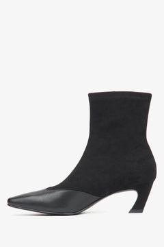 Estro Damen-Stiefeletten in Schwarz aus einer Kombination von weichen Textilien und Leder mit niedrigem Absatz.
