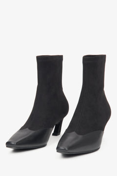 Schwarze Damen-Stiefeletten mit niedrigem Absatz aus weichen Textilien und Leder, entworfen von Estro.