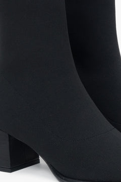 Damen-Stiefeletten in Schwarz mit niedrigem Absatz und bequemem, weichem Schaft von Estro – Details.