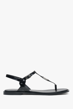 Rechte Seitenansicht der schwarzen flachen Damen-Sandalen von Estro