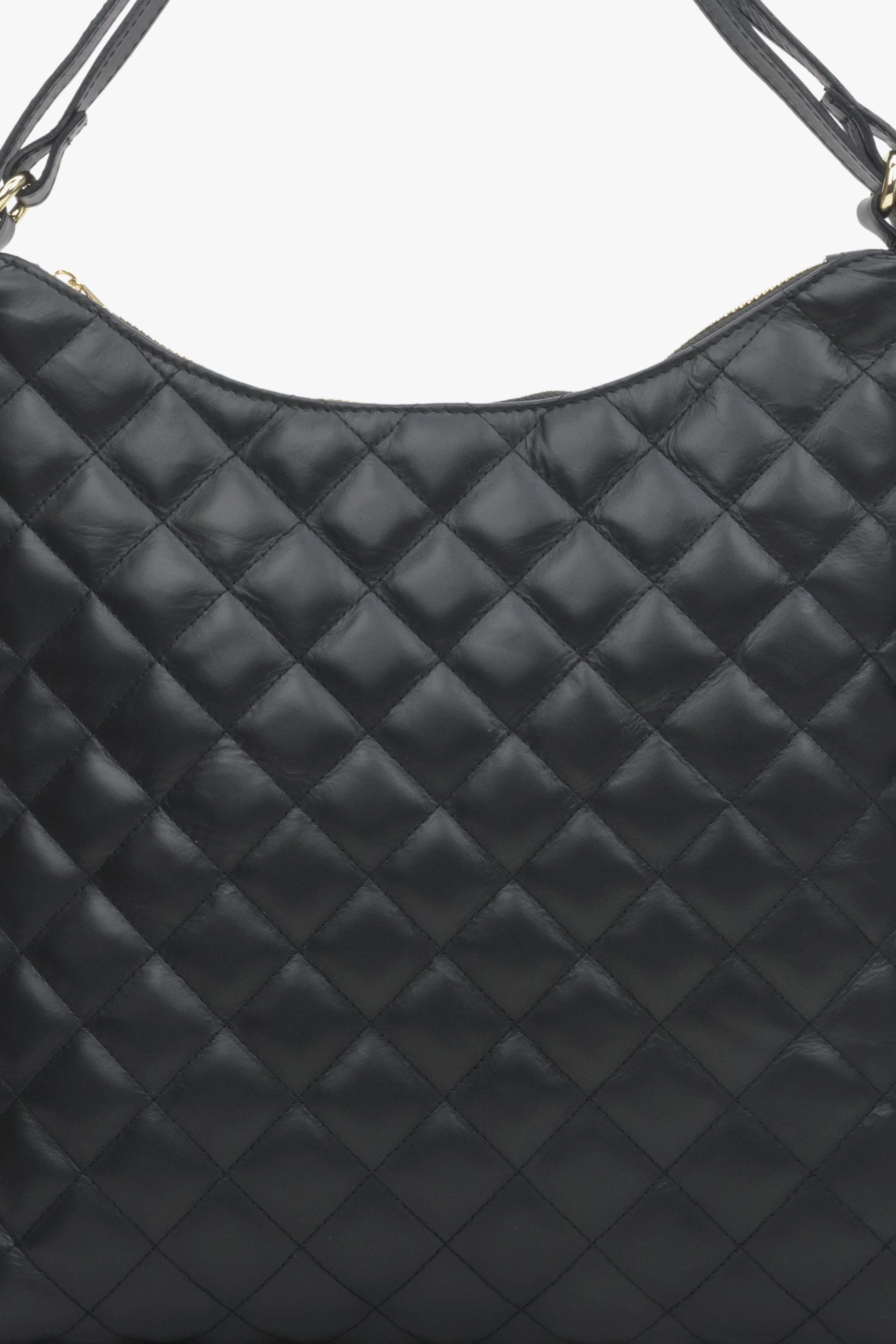 Gesteppte schwarze Ledertasche für Damen.