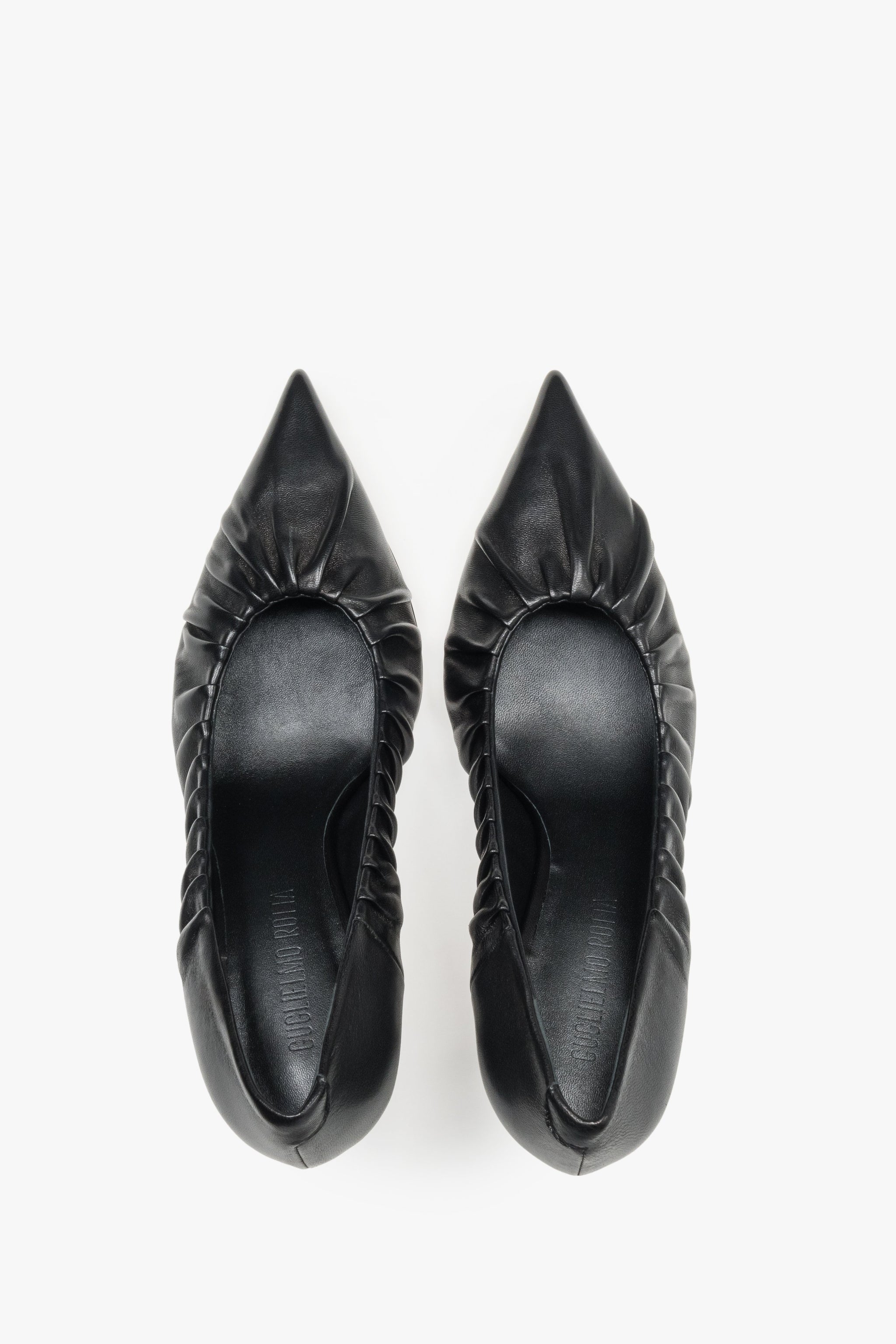 Paar schwarze High Heels von Guglielmo Rotta von oben