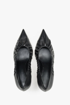 Paar schwarze High Heels von Guglielmo Rotta von oben