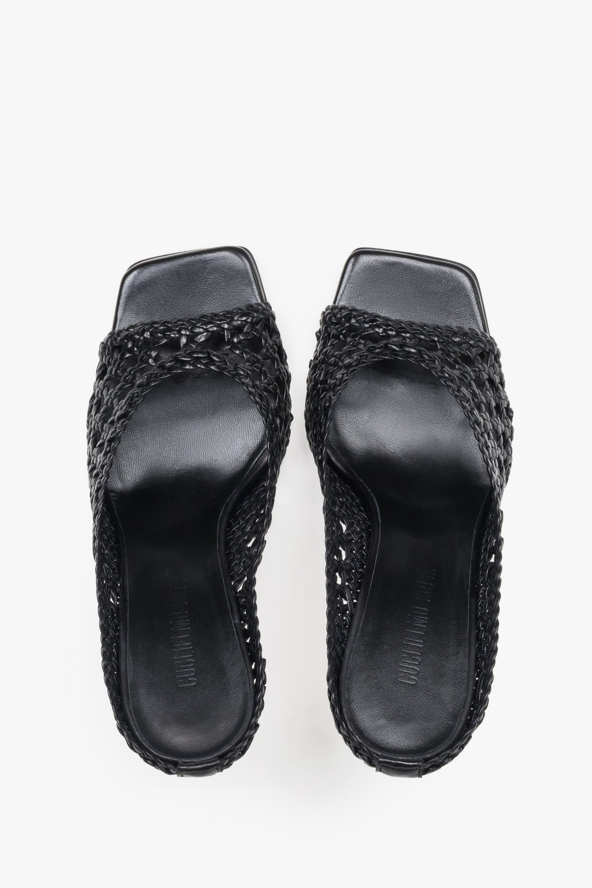 Paar schwarze Mules von Guglielmo Rotta von oben