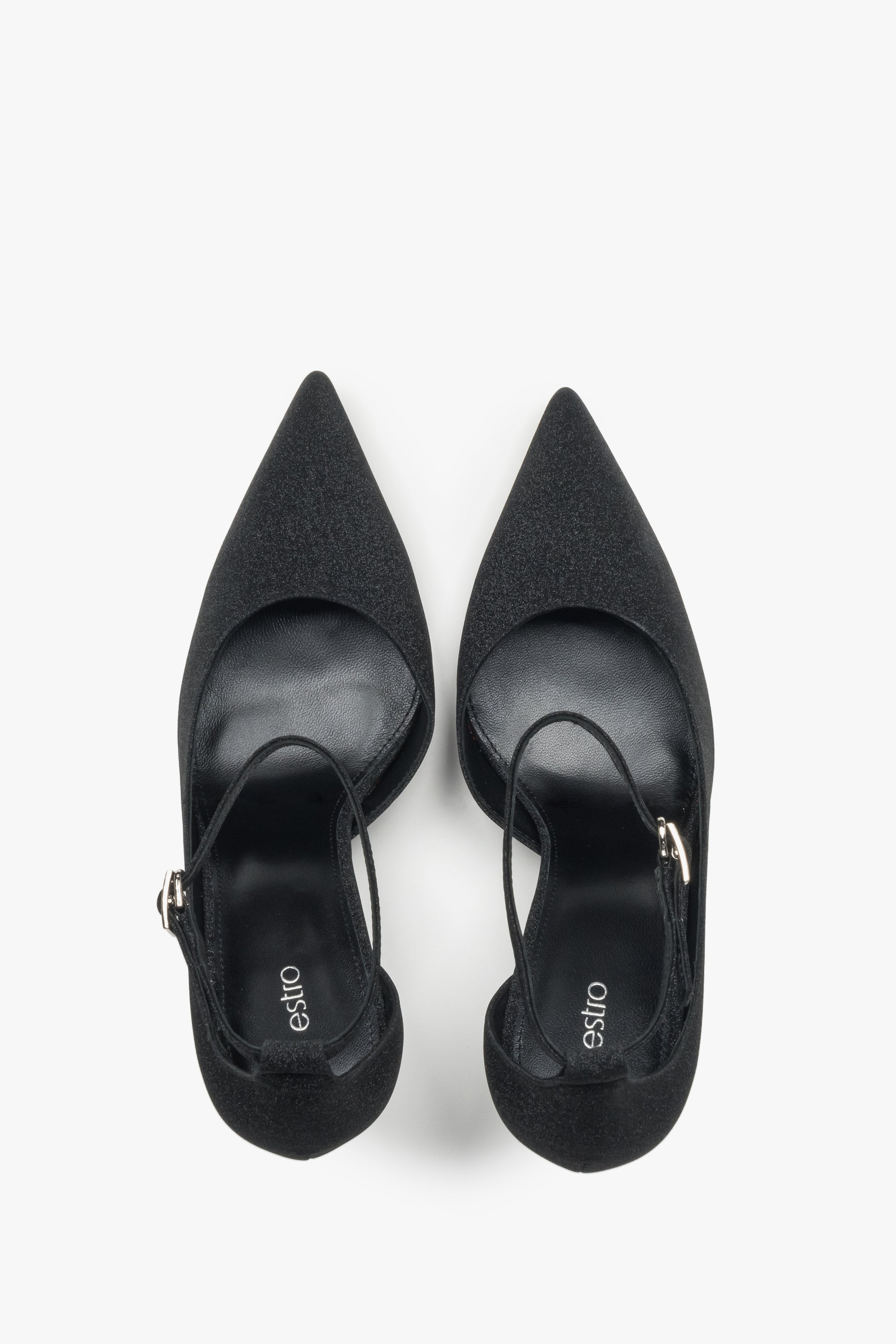 Hochwertige schwarze Lederschuhe mit hohem Absatz i dekorativem Element. 