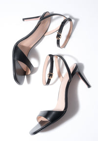 Schwarze Damen-Sandalen mit Stiletto-Absatz Estro ER00119510.