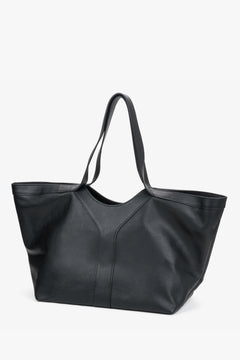 Seitenansicht des schwarzen Estro Shoppers mit stabilen Tragehenkeln i elegantem Design. 