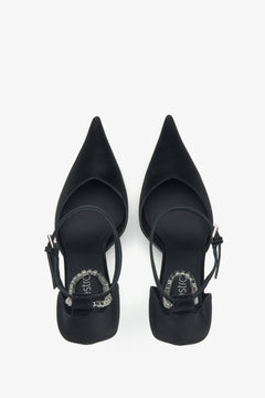 Stilvolle schwarze Pumps von Estro aus strukturiertem Leder mit Kristallbesatz.