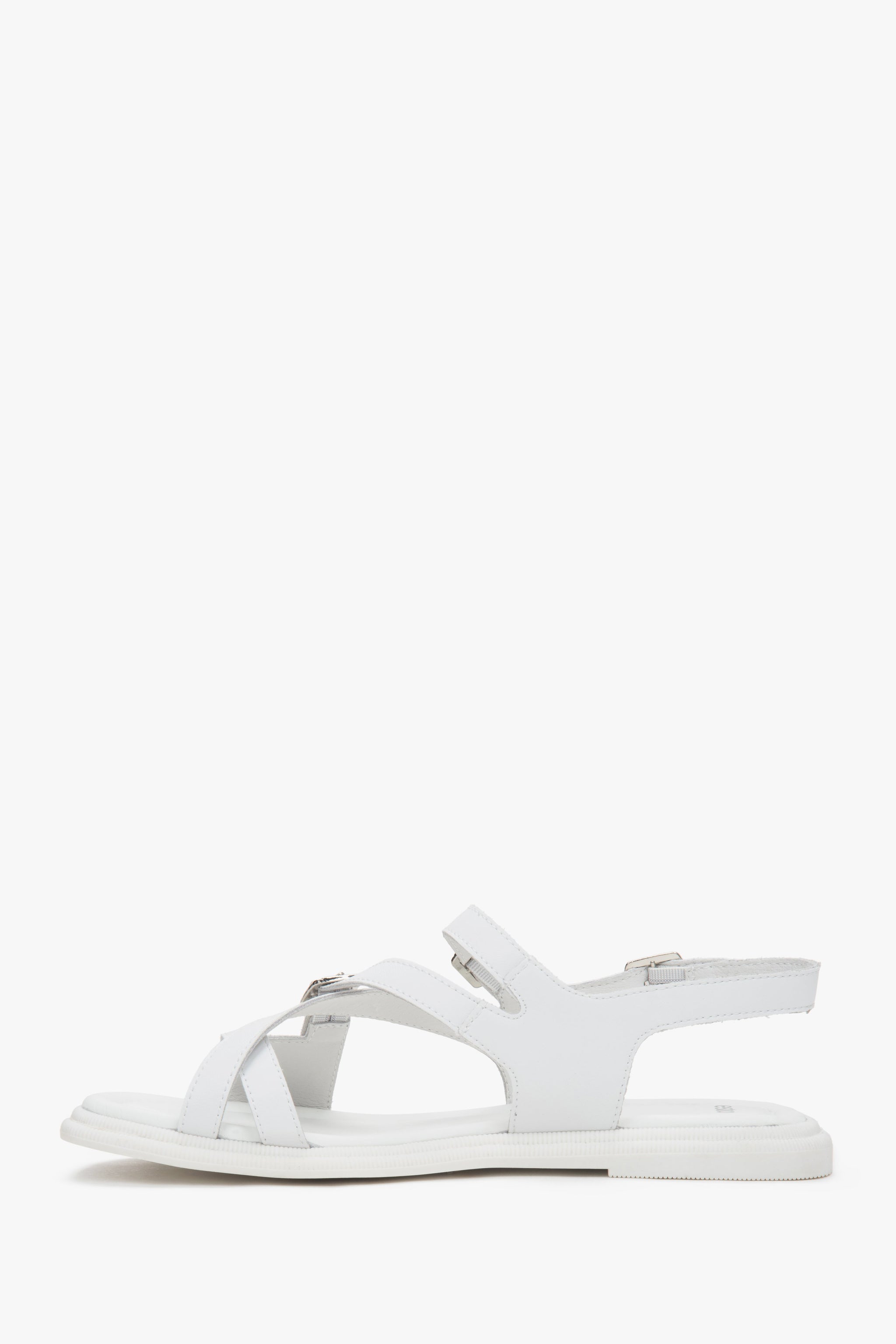 Flache Seitenansicht der weißen Sandalen mit TPR-Gummisohle.