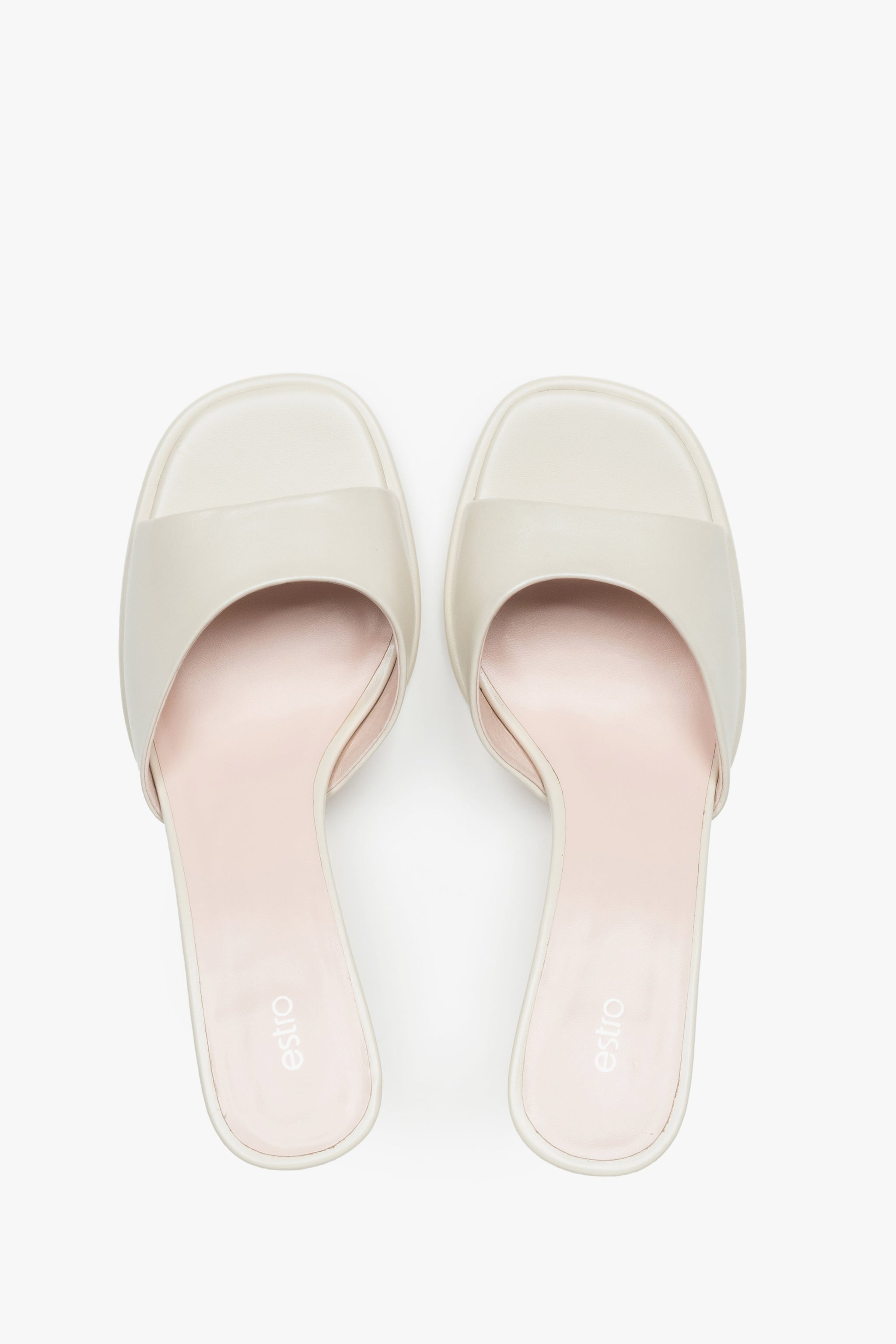 Exklusive Damen-Mules aus weißem Naturleder für einen luxuriösen Sommer-Look.