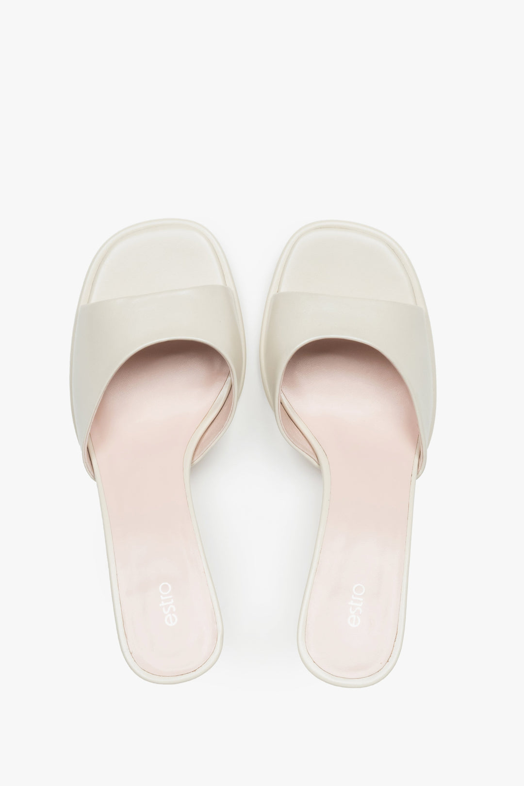 Exklusive Damen-Mules aus weißem Naturleder für einen luxuriösen Sommer-Look.