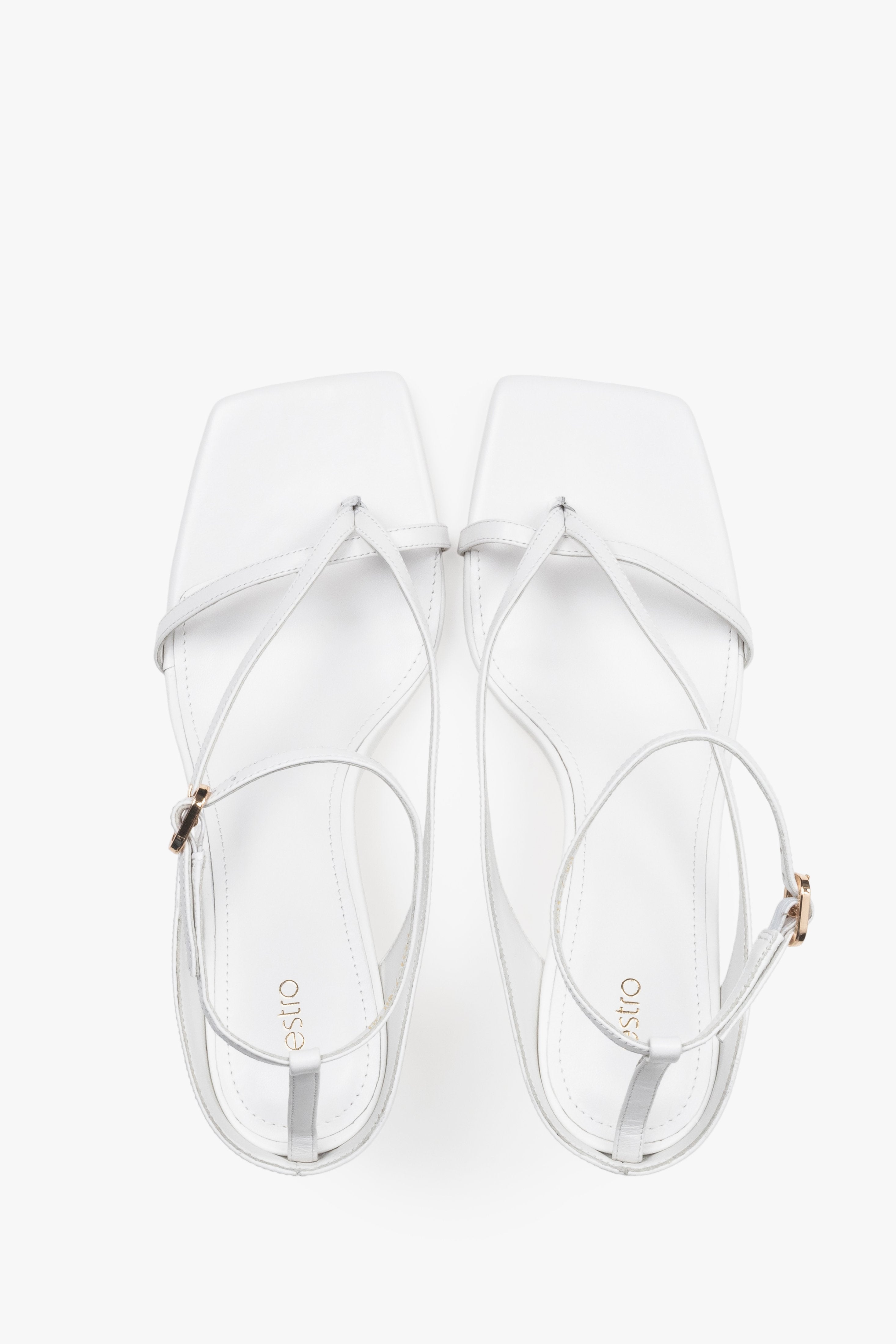 Paar weiße Leder-Sandalen in Zehensteg-Optik von Estro